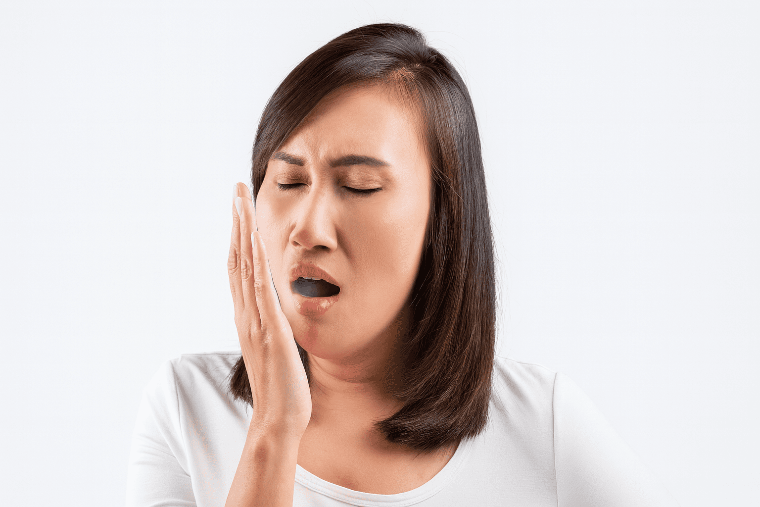 girl suffering through bad breath